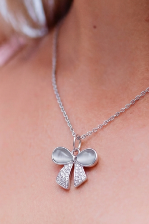Silver Bow Pendant Necklace with Floral Stud Earrings Combo Set for Women | Elegant Party Wear Jewellery Gift Set